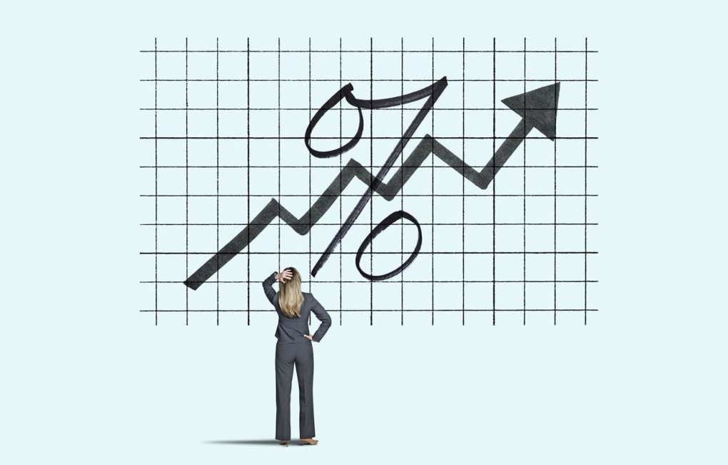 Woman-watching-interest-rates-rise