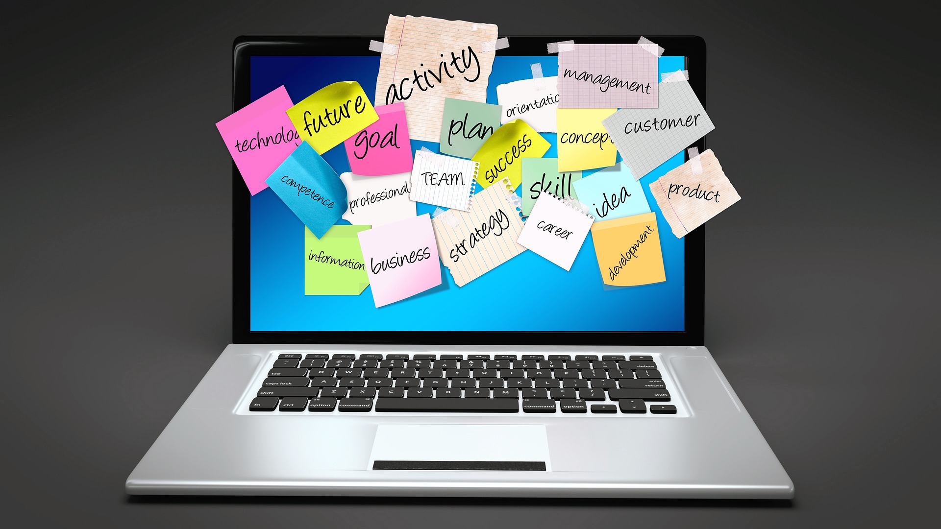 Post it bulletin board on an open laptop